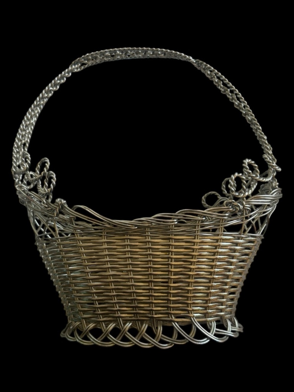 Vintage woven copper SP wire basket with a braided handle
